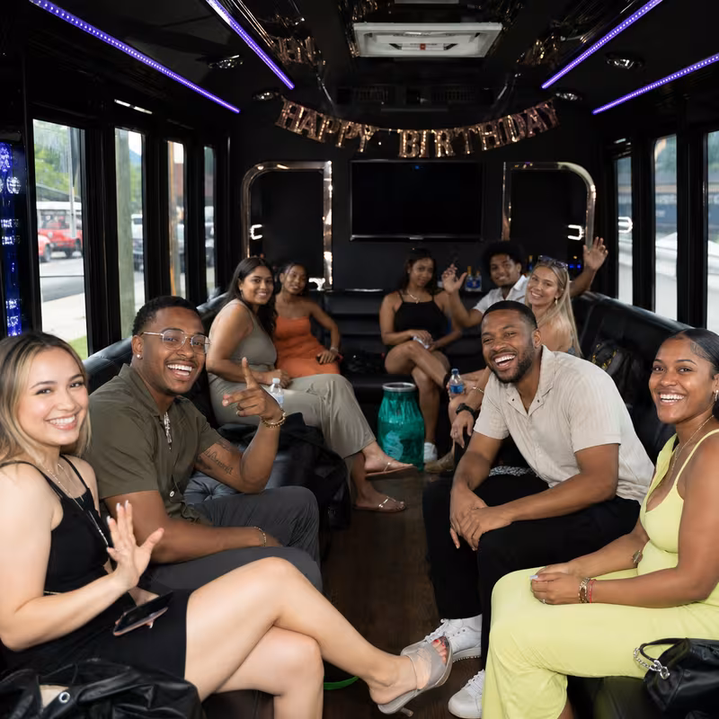 Black Mercedes Sprinter van staged for an Omaha Birthday Transportation group