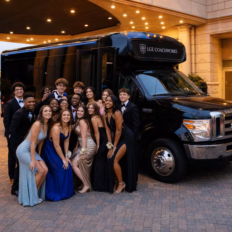 Party bus interior with wraparound leather seating and LED lighting in Omaha